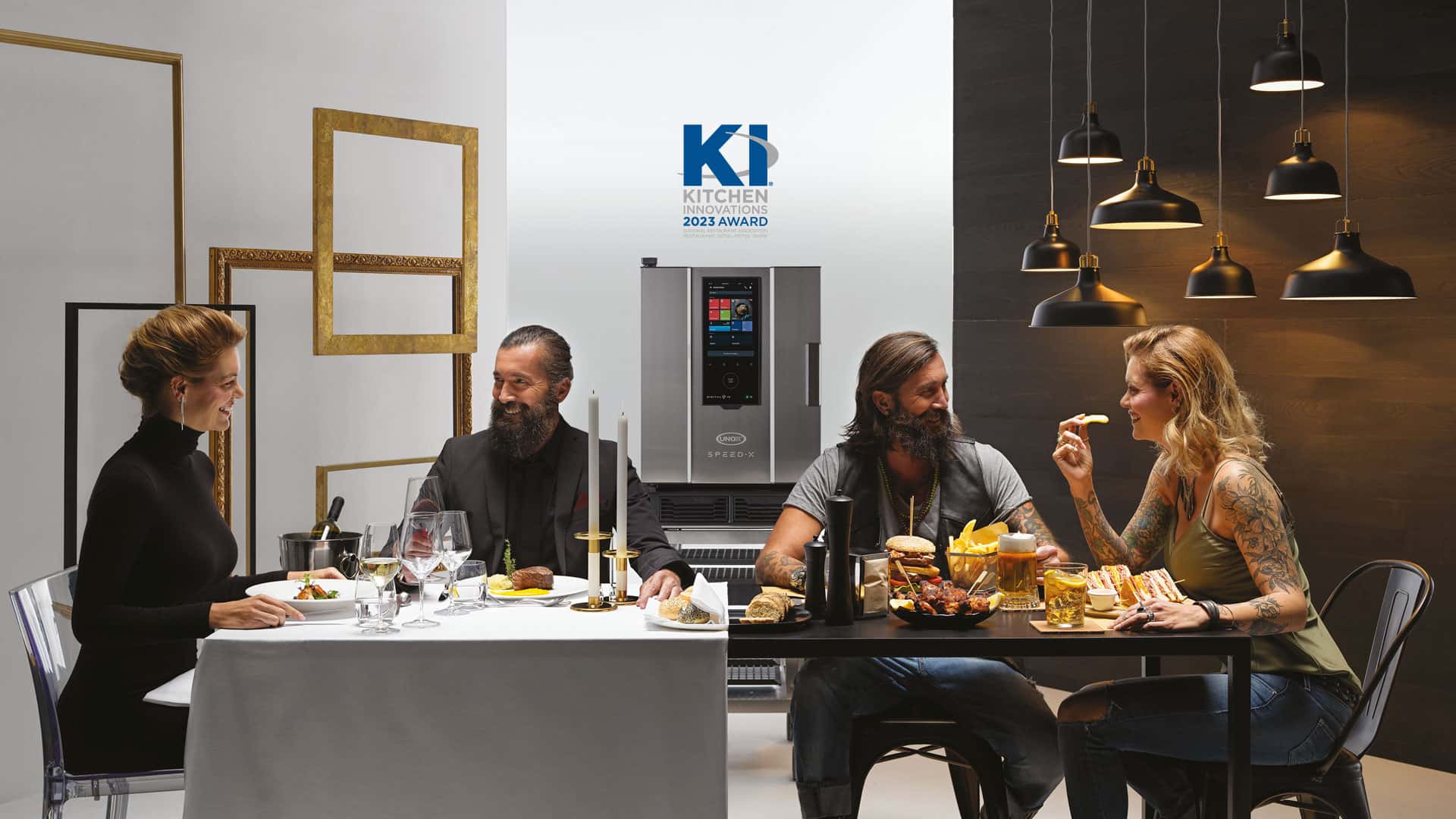 A large dining table, with two couples. One couple are eating fine dining and the other are eating burgers. An Unox speed oven is in the centre.