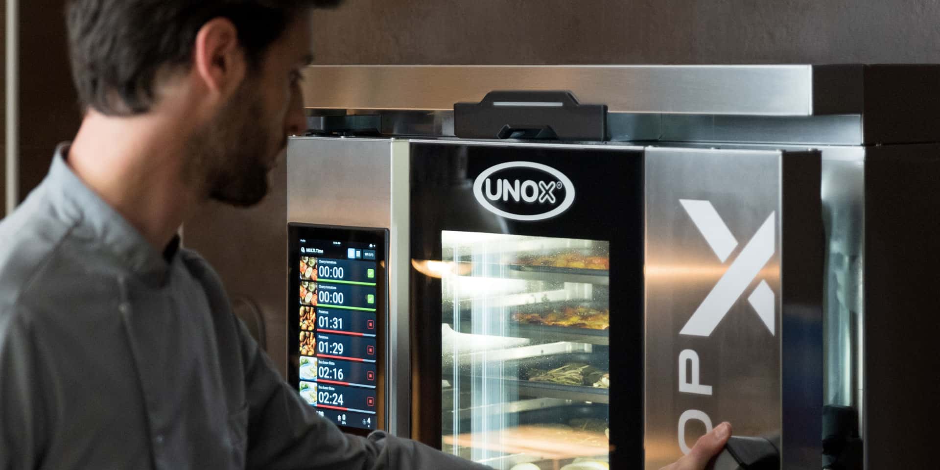 chef opens commercial combi oven CHEFTOP-X™ and BAKERTOP-X™