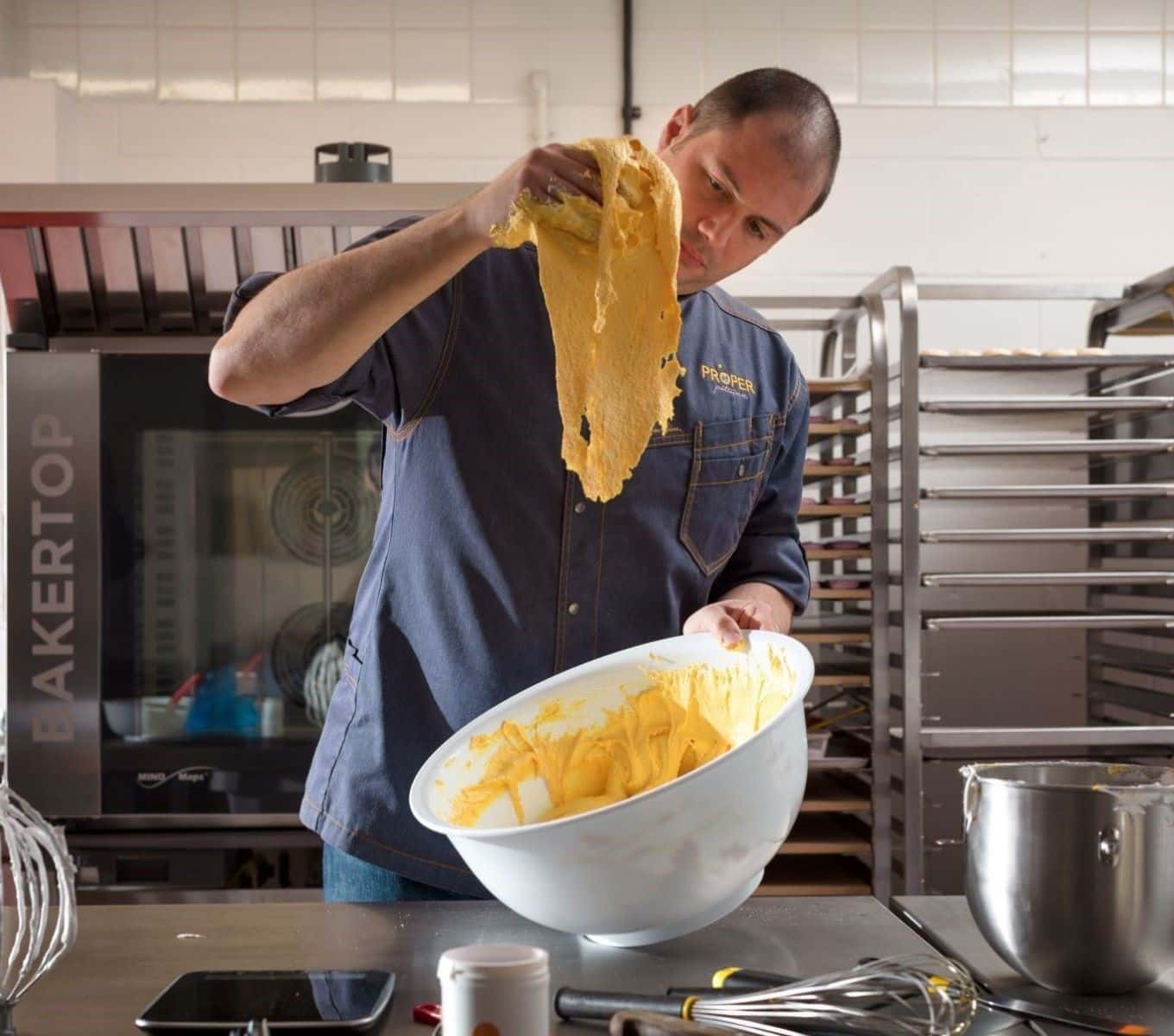 chef with commercial electric oven for pastry shop and bakeries