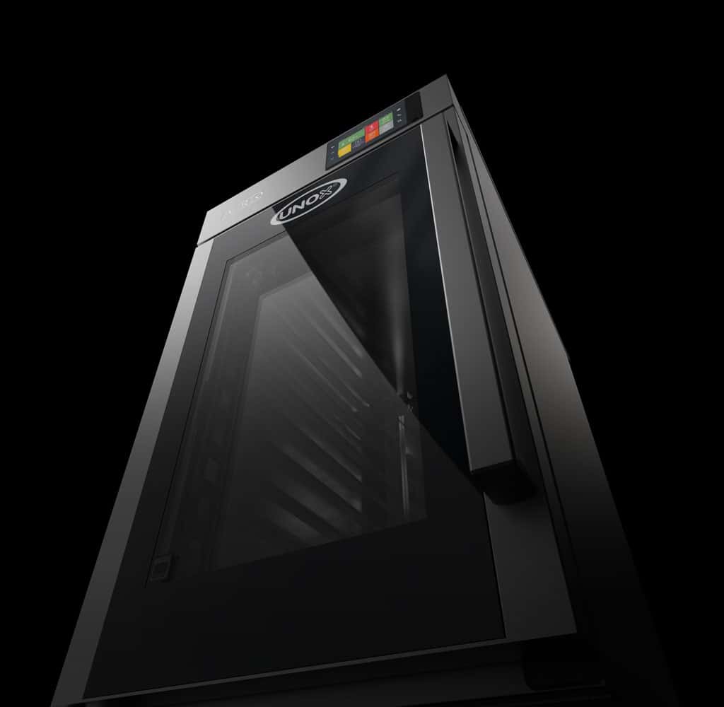 A dark, moody image of an Unox evereo hot holding cabinet, lit so that only parts of the logo and digital display can be seen. 